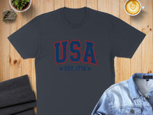 Load image into Gallery viewer, Dark grey t-shirt with "USA" and "EST. 1776" text.
