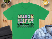 Load image into Gallery viewer, Green t-shirt with "Nurse Life Is The Best Life" text and colorful flowers.
