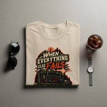Load image into Gallery viewer, T-shirt with "When Everything Else Fails" radio graphic and outdoor scene.
