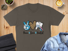 Load image into Gallery viewer, T-shirt with peace sign, leopard heart, tooth, and toothbrush reading "Peace Love Dental."
