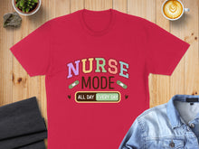 Load image into Gallery viewer, Red t-shirt with "Nurse Mode All Day Every Day" text and band-aids.
