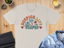 Load image into Gallery viewer, Hospice Nurse with stethoscope, mask, and hearts graphic.
