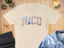 Load image into Gallery viewer, Cream t-shirt with "NICU" spelled out in patchwork fabric letters.
