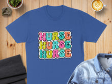 Load image into Gallery viewer, Blue t-shirt with "Nurse" in colorful, retro bubble letters.

