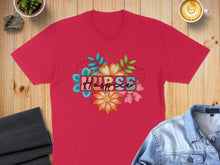 Load image into Gallery viewer, Red t-shirt with floral "Nurse" graphic.
