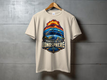 Load image into Gallery viewer, Cream t-shirt with "Powered by the Ionosphere" graphic featuring Earth, sun, and radio waves.
