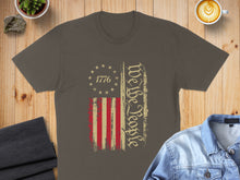 Load image into Gallery viewer, T-shirt with distressed American flag and "We The People" text.
