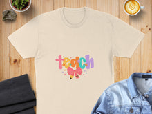 Load image into Gallery viewer, T-shirt with colorful "teach" text and pencil graphic.
