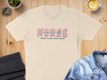 Load image into Gallery viewer, Tan t-shirt with "NURSE COFFEE.SCRUBS.RUBBER GLOVES" text.
