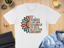 Load image into Gallery viewer, IT TAKES A LOT OF SPARKLE TO BE A HOSPICE NURSE graphic tee.
