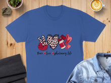 Load image into Gallery viewer, Blue t-shirt with leopard print peace sign, heart, and pills design.
