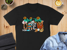 Load image into Gallery viewer, Black t-shirt with "Med Tech Crew" design featuring medical icons and sunflowers.
