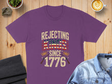 Load image into Gallery viewer, Purple t-shirt with "Rejecting Kings Since 1776" text and American flag design.
