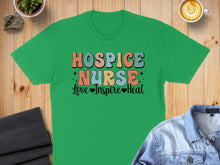 Load image into Gallery viewer, Green t-shirt with "Hospice Nurse Love Inspire Heal" text in colorful retro font.
