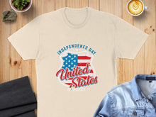 Load image into Gallery viewer, Cream t-shirt with "Independence Day United States of America" shield logo.
