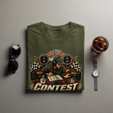 Load image into Gallery viewer, Olive green t-shirt featuring "CONTEST" graphic with ham radio operator and equipment.
