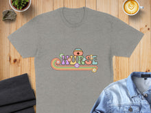 Load image into Gallery viewer, Grey t-shirt with "Nurse" in colorful retro floral lettering.
