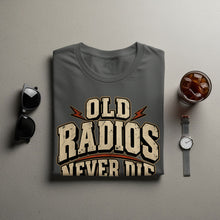 Load image into Gallery viewer, Gray t-shirt with "OLD RADIOS NEVER DIE" text design.
