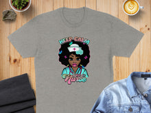 Load image into Gallery viewer, Grey t-shirt with cartoon nurse graphic and "Keep Calm I'm a Nurse" text.
