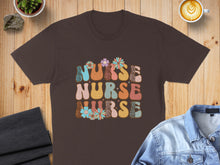 Load image into Gallery viewer, Brown t-shirt with "Nurse" in colorful leopard print and floral letters.
