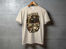Load image into Gallery viewer, Cream t-shirt graphic with "COFFEE CONTACTS 73" text and radio equipment.
