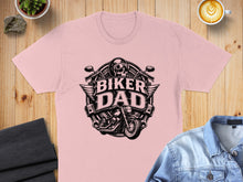 Load image into Gallery viewer, Pink t-shirt with "Biker Dad" text and motorcycle skull graphic.
