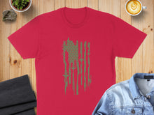 Load image into Gallery viewer, Red t-shirt with distressed US flag graphic of rifles.
