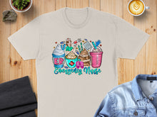 Load image into Gallery viewer, T-shirt graphic with "Emergency Nurse" text, coffee drinks, and medical icons.
