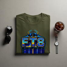 Load image into Gallery viewer, Olive green t-shirt with "FT8" graphic featuring a globe, radio tower, and spectrum analyzer.
