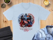 Load image into Gallery viewer, Light blue t-shirt with patriotic cross, wings, and roses graphic.
