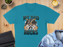 Load image into Gallery viewer, Teal t-shirt with "MY DAD ROCKS" and two guitars graphic.
