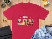 Load image into Gallery viewer, Red t-shirt with "Nursing is in my DNA" text and syringe graphic.
