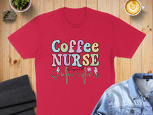 Load image into Gallery viewer, Red t-shirt with "Coffee Nurse Repeat" in colorful retro lettering and a heartbeat line.
