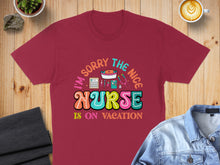 Load image into Gallery viewer, Burgundy t-shirt with "I'm sorry the nice nurse is on vacation" text and graphics.
