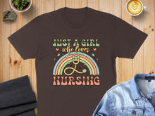 Load image into Gallery viewer, Brown t-shirt with "JUST A GIRL WHO LOVES NURSING" in pastel rainbow text.
