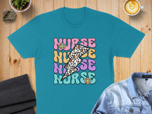 Load image into Gallery viewer, Teal t-shirt with "Nurse" text in groovy font and leopard print lightning bolt.

