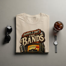 Load image into Gallery viewer, T-shirt with "Sorry, I can't. The Bands" text and vintage radio graphic.
