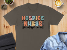 Load image into Gallery viewer, Brown t-shirt with colorful "Hospice Nurse" text and "Love Inspire Heal" slogan.
