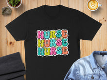 Load image into Gallery viewer, Black t-shirt with "Nurse" in colorful, wavy letters and floral accents.
