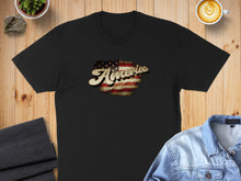 Load image into Gallery viewer, Black t-shirt with distressed American flag graphic and "America" text.
