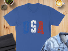 Load image into Gallery viewer, Blue t-shirt with distressed "USA" flag design.
