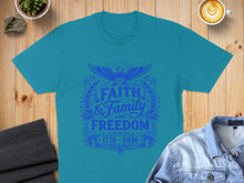 Load image into Gallery viewer, Teal t-shirt with "Faith and Family and Freedom 1776-2026" graphic.
