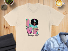 Load image into Gallery viewer, Cream t-shirt with "LOVE" text and a nurse with butterflies.
