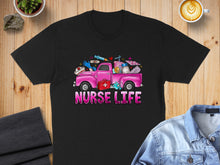 Load image into Gallery viewer, Black t-shirt with pink truck graphic and "NURSE LIFE" text.
