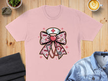 Load image into Gallery viewer, Pink t-shirt with a cartoon stethoscope and XOXO bow design.
