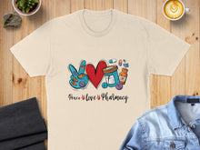 Load image into Gallery viewer, T-shirt with "Peace, Love, Pharmacy" text, a heart, and medical items.
