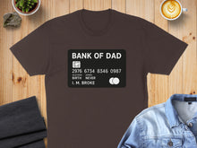 Load image into Gallery viewer, Brown t-shirt with "BANK OF DAD" credit card design.

