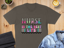 Load image into Gallery viewer, "Nurse Life is the Best Life" text on a brown t-shirt with colorful, glittery lettering.
