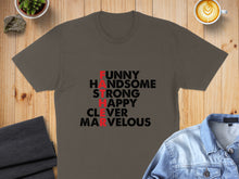 Load image into Gallery viewer, Brown t-shirt with red and black text: FUNNY, HANDSOME, HAPPY, CLEVER, MARVELOUS.
