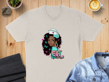 Load image into Gallery viewer, Light tan t-shirt with a nurse graphic featuring a Black woman with butterflies.
